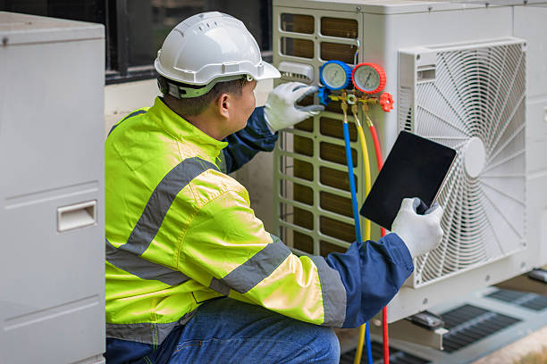 Professional Heat Pump Repair technician working in Hebron, NE
